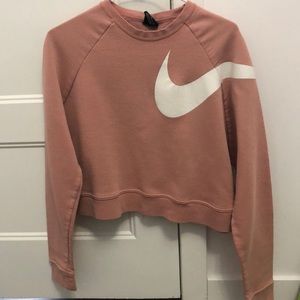 It’s a large but fits more like a medium. Wore several times but looks new